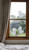 Lifestyle photo showing a frosted T-Rex window cling displayed on a room window, highlighting its etched-glass texture and soft matte finish.