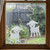 Two frosted Lamb window clings displayed on a window, showing left and right-facing designs with etched-glass texture and soft matte finish.