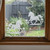 Two frosted Pony window clings displayed on a window, showing left and right-facing designs with etched-glass texture and soft matte finish.