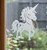 Close-up of a right-facing frosted  Sprinklesong - Unicorn window cling clinging to glass, showing etched-glass texture and soft matte finish.