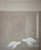 Turtle frosted window cling applied to shower glass, highlighting its reusable static‑cling material, water‑friendly application, and elegant etched‑glass look.