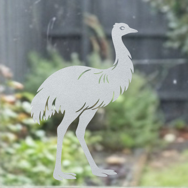 Close-up of a right-facing frosted  Emu window cling clinging to glass, showing etched-glass texture and soft matte finish.