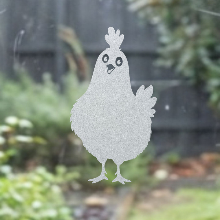 Close-up of a left-facing frosted Funny Chook window cling clinging to glass, showing etched-glass texture and soft matte finish.