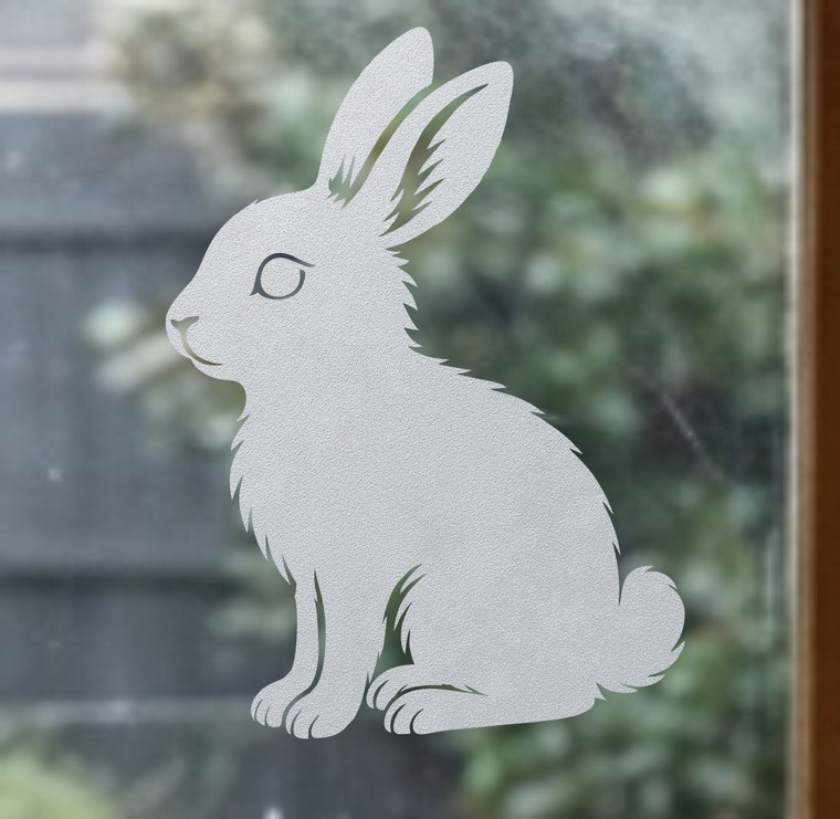 Close-up of a left-facing frosted Bunny Rabbit window cling clinging to glass, showing etched-glass texture and soft matte finish.