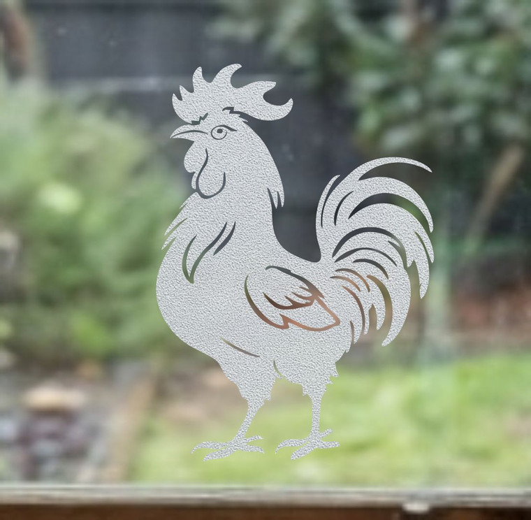 Close-up of a left-facing frosted Rooster window cling clinging to glass, showing etched-glass texture and soft matte finish.