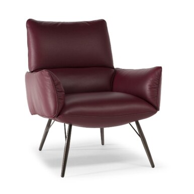 dark burgundy comfortable armchair with tall black legs