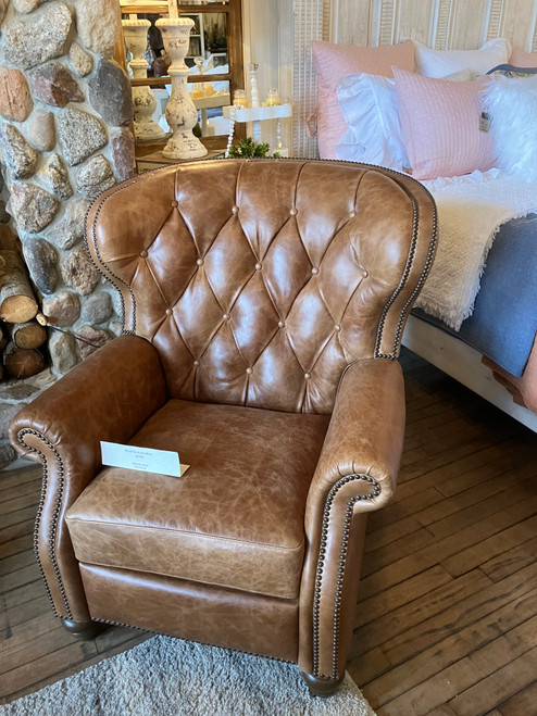 Tufted push back recliner  $5399.00  One in stock.