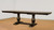 Chateau Double Pedestal Table shown with center leaves.