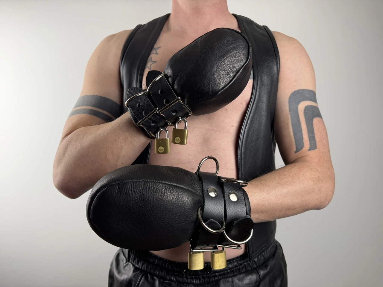 Handmade leather containment mitt by Restrict Gear