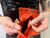 Black Latex Wrist Wallet with Red Latex Lining by Restrict Gear — product image 4