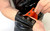 Black Latex Wrist Wallet with Red Latex Lining by Restrict Gear — product image 1