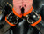 Chunky rubber wrist cuffs with lockable buckle fastening
Custom colour padded rubber wrist restraints