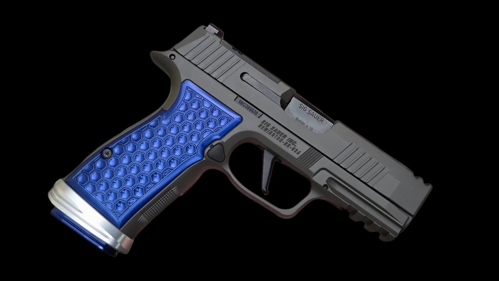 SIG P365 AXG with Vytal Kraken grips, matching basepad and magwell in Sapphire Blue