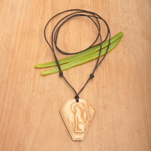 Carved Bone Pendant Necklace with Coyote Made in Indonesia 'Coyote Song'