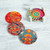 Four Round Multicolored Mexican Pinewood Decoupage Coasters 'Round Huichol'
