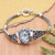 Traditional Pendant Bracelet with Faceted 6-Carat Blue Topaz 'Penglipuran's Treasure'