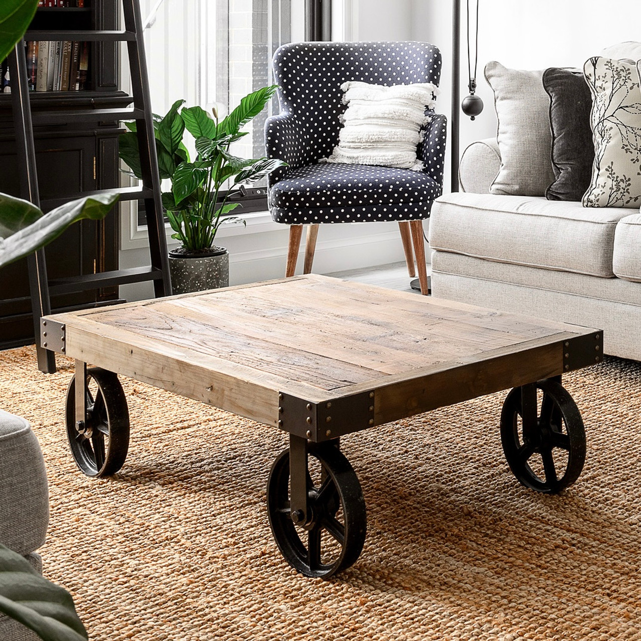 Rustic coffee table with shop wheels