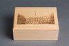 A wooden box with a photo of Penn State Old Main building laser-etched on top.