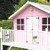 Children's wooden Wendy playhouse painted using Wood Stain + Protect in Baby Pink