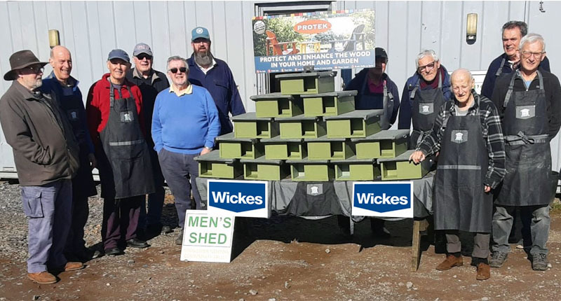 Midsomer Norton Men’s Shed team with the hedgehog boxes