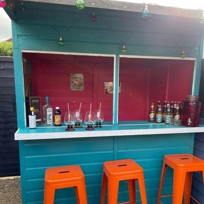 Love Your Garden bar painted in teal