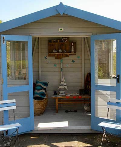 a summer house/garden room would not be out of place even in a small garden