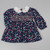 BABY GIRLS LINED SMOCKED FLORAL DRESS (12-24 MONTHS)