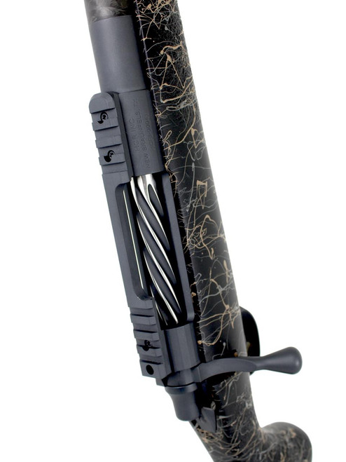 SOLD! Carbon Rifleman in 7 PRC #M1916, close-up of the bolt action rifle with a distinctive marble pattern on the stock and a modern tactical scope mount.
