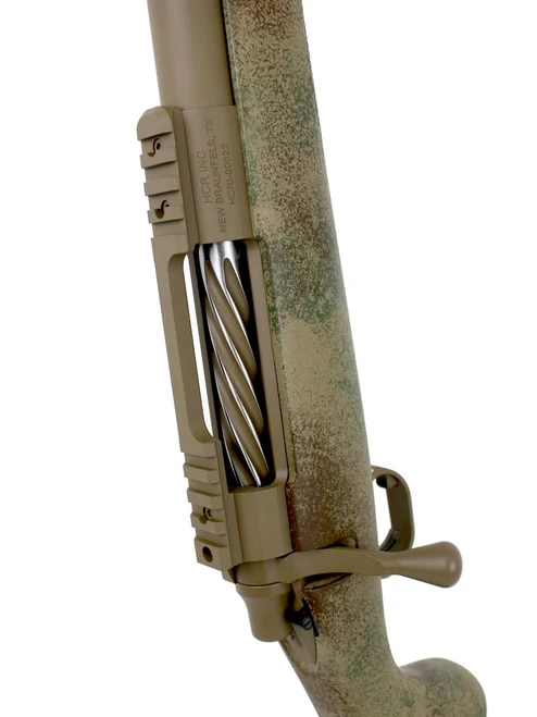 SOLD! Carbon Rifleman in 7 PRC, close-up image of the rifle's bolt and receiver showing a tan finish with a camouflage pattern, and the bolt handle.