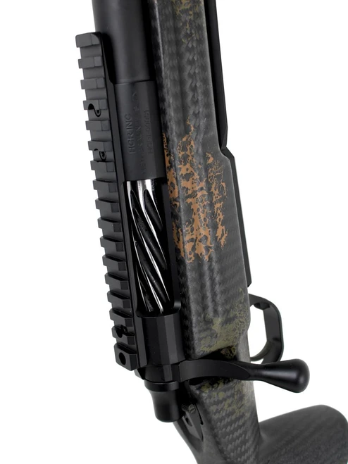 SOLD! Carbon Hunter in 6mm Creedmoor, close-up view of the firearm with custom camouflage stock and rail system.