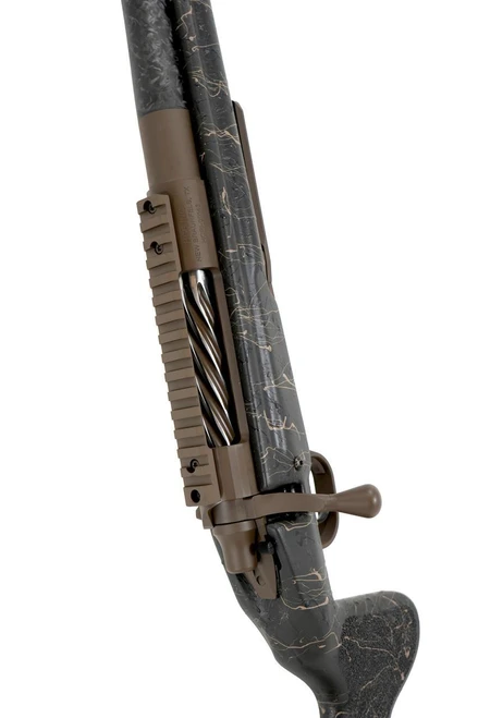 SOLD! Carbon Hunter in 300 Win Mag, tactical bolt-action rifle with a camouflage-style stock and a fluted barrel.