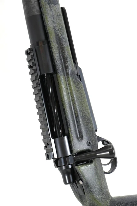 SOLD! Pathfinder in 7mm PRC, rifle with rugged camo finish, mounted scope, and modular rail system for accessory attachment.