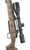 Hunt Ready Package: Carbon Rifleman in 300 PRC, a hunting rifle with a camouflage stock and a mounted scope for precision shooting.