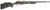 Carbon Rifleman in 7mm PRC - 20" Woodland Mirage, side view of a bolt-action rifle with a woodland camouflage stock, tan receiver, carbon-fiber barrel, and muzzle brake on a white background.