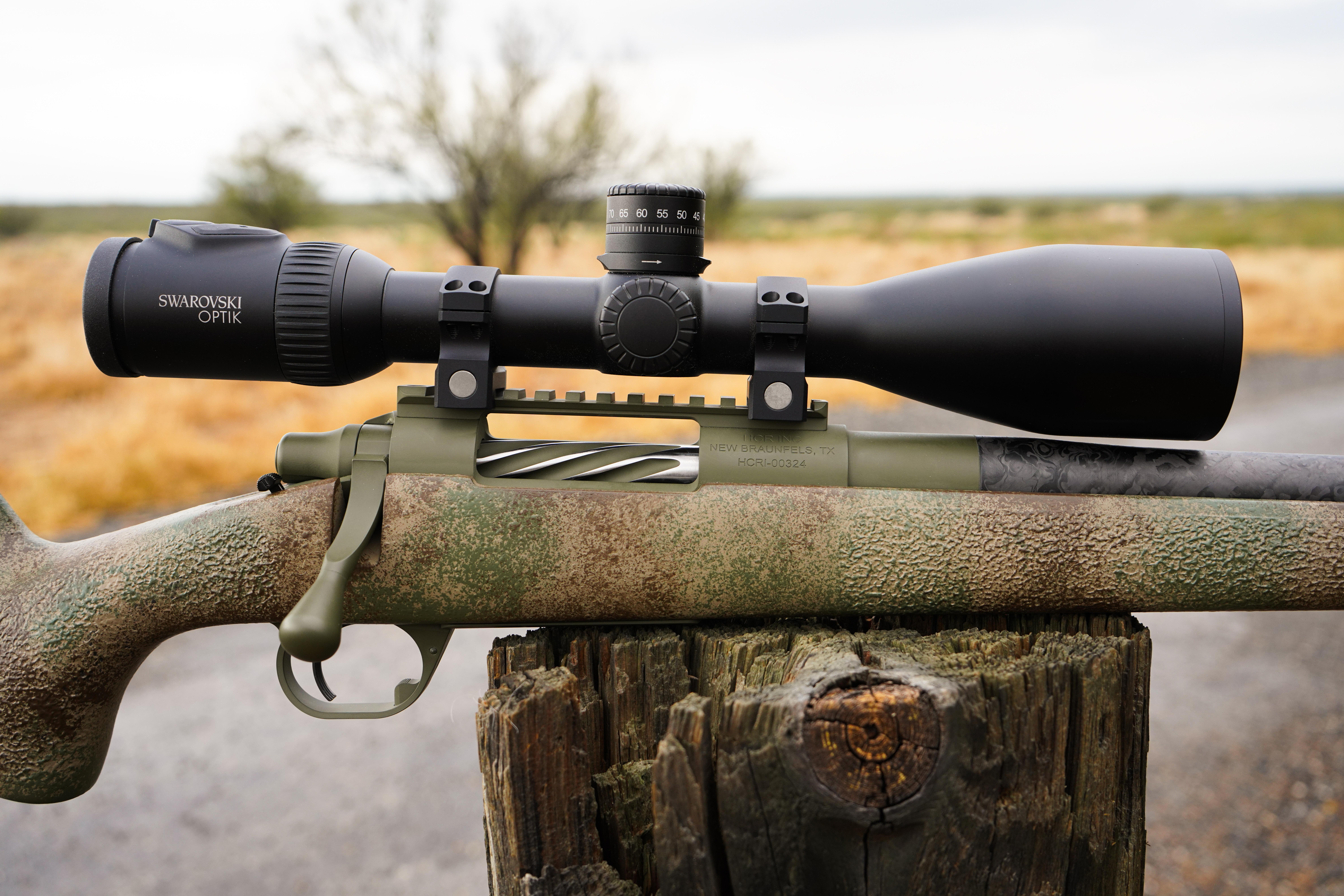 Control feed rifle action resting on Cape buffalo — showing the bolt and extractor assembly