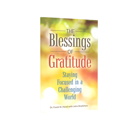 Front cover of the pocketbook "The Blessings of Gratitude" by  Doctor Frank Hazel with John Bradshaw.