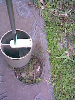 The Turf-Tec Cemetery Vase Clean Out Tool is simply inserted into a cordless drill and placed into the monument vase to be cleaned out. 