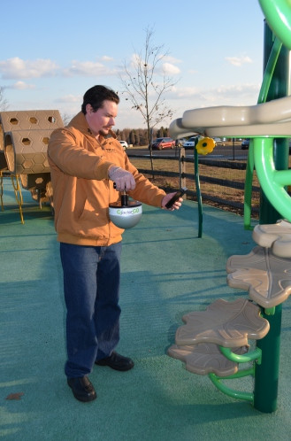 Dropping the GoFactorGO Wireless Playground Impact Tester on a playground surface for HIC Testing and gMax