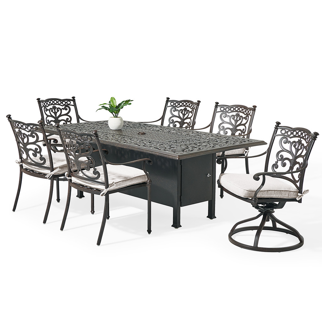Full set including table, six chairs and a swivel arm chair