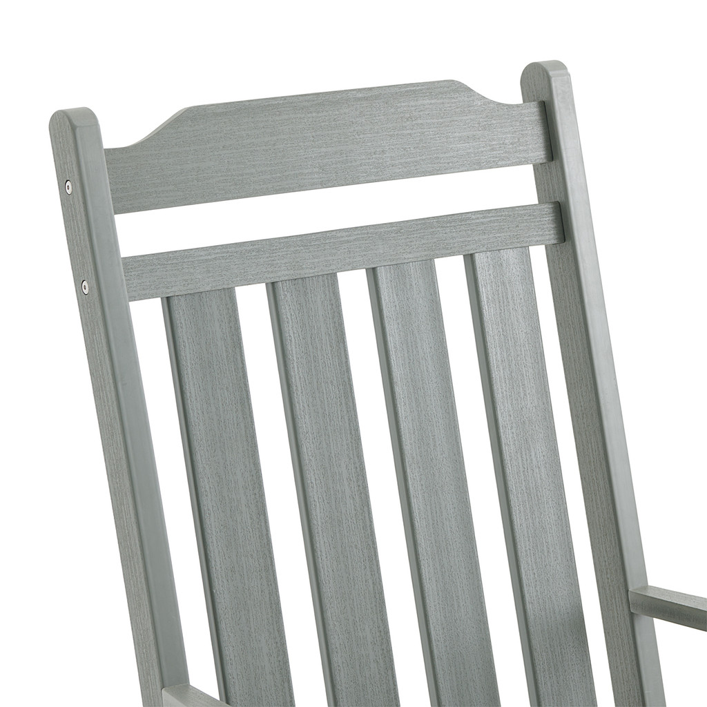 Close-up of the backrest slats and frame of a gray polymer porch rocker.