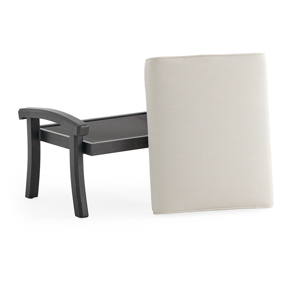 Close-up of cushion against armrest and frame