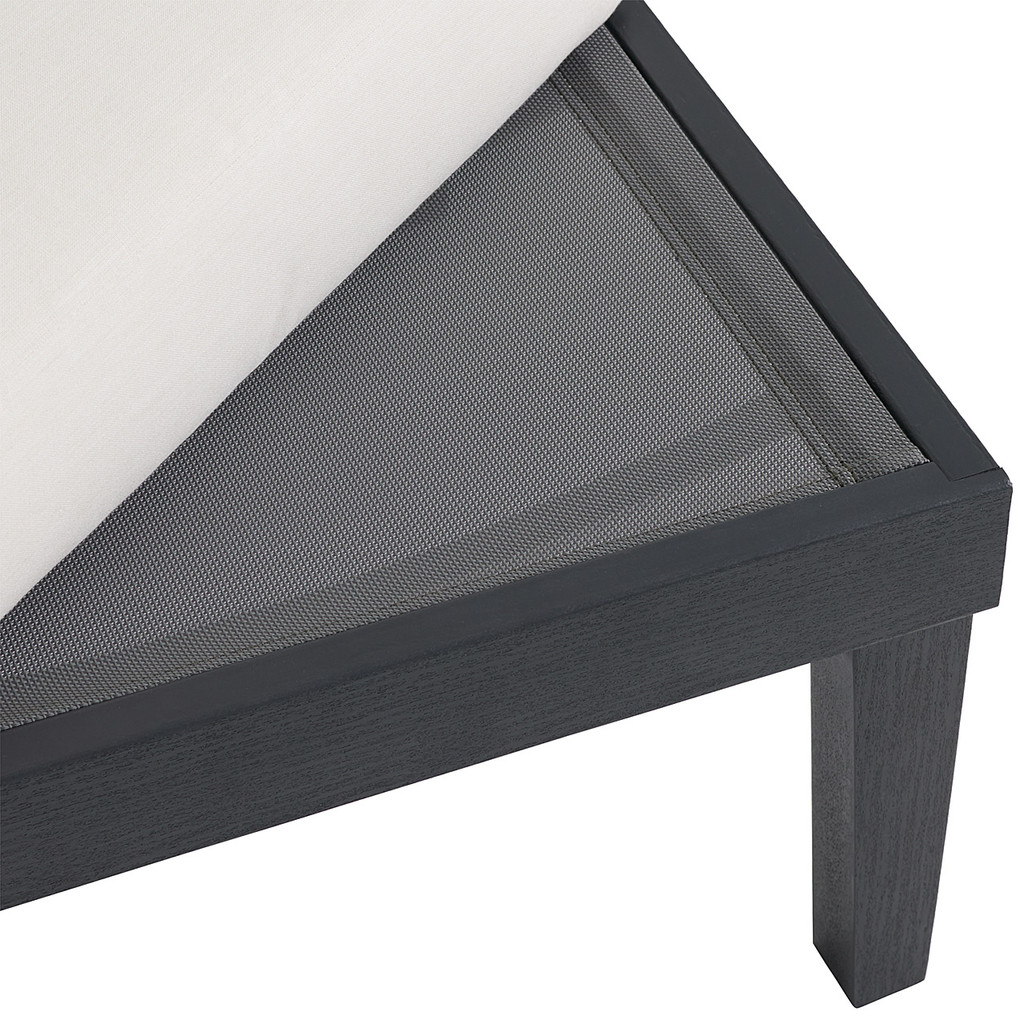 Close-up of the fabric cushion and dark frame showing texture and construction