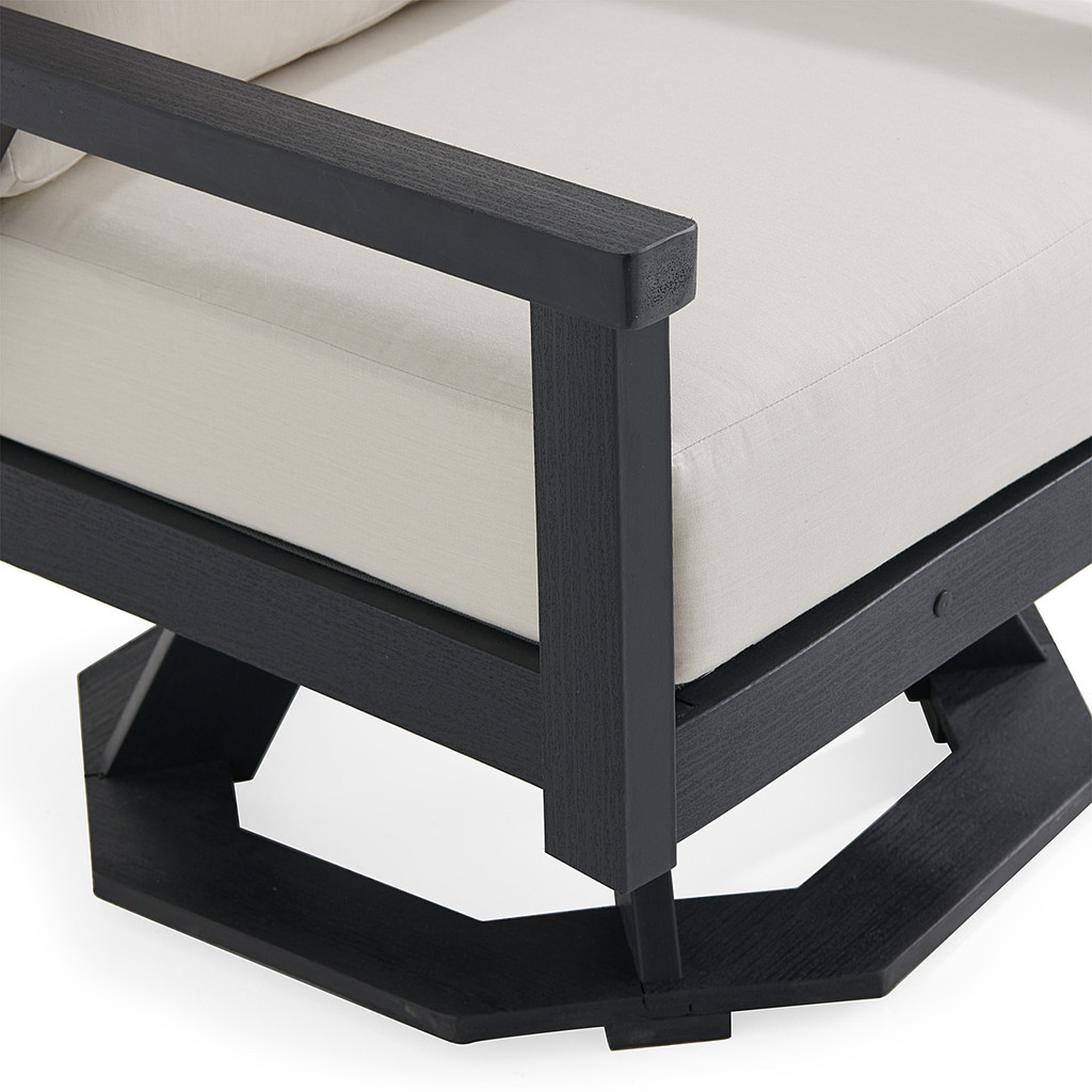 Close-up of armrest and frame corner of chair