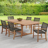 Hampton Driftwood Outdoor Wicker and Solid Teak 7 Piece Arm Dining Set + 67-87 x 47 in. Extension Table