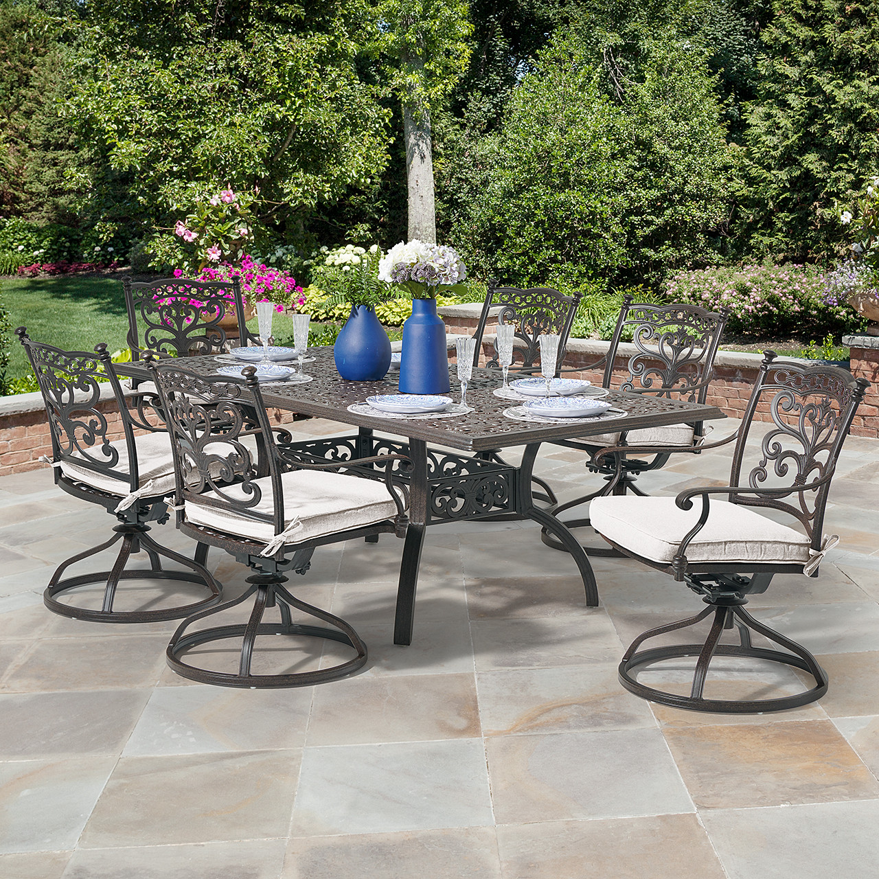 Milan Aged Bronze Cast Aluminum with Cushions 7 Piece Swivel Rocker Dining Set + 84 x 42 in. Table