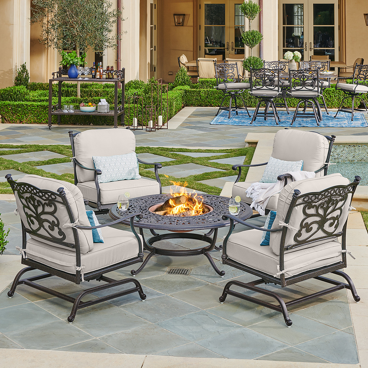 Milan Aged Bronze Cast Aluminum and Cushion 5 Pc. Spring Chat Group in with 48 in. D Fire Pit Table