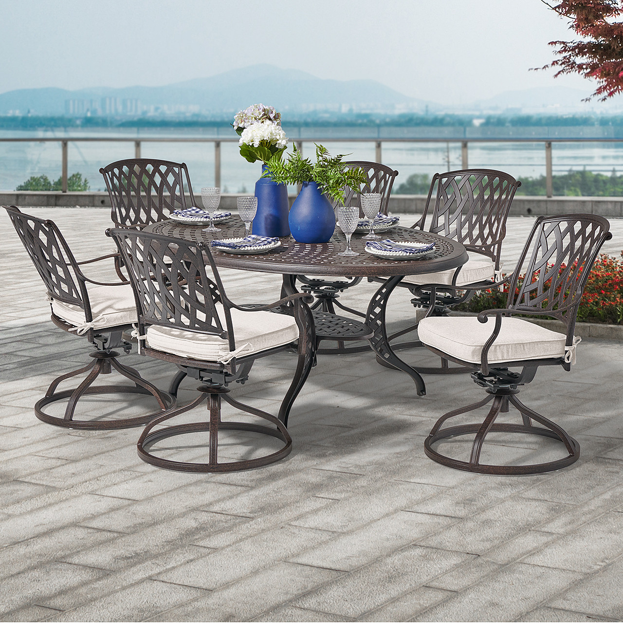 Tivoli Aged Bronze Cast Aluminum with Cushions 7 Piece Swivel Dining Set with 66 x 44 in. Table