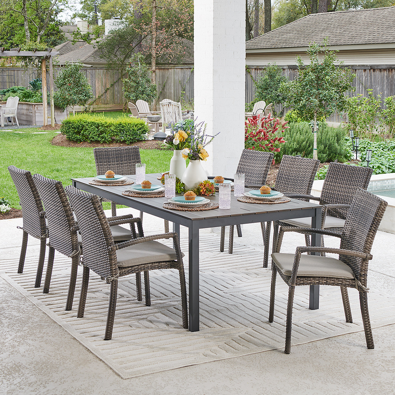 Contempo Husk Outdoor Wicker with Cushions 9 Piece Dining Set + 83 x 41 in. Table