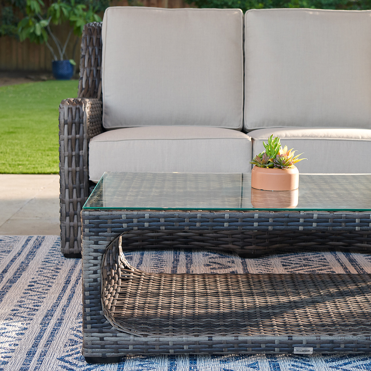 Tangiers Canola Seed Outdoor Wicker with Cushions 3 Piece Swivel Sofa Group + 46 x 26 in. Glass Top Coffee Table