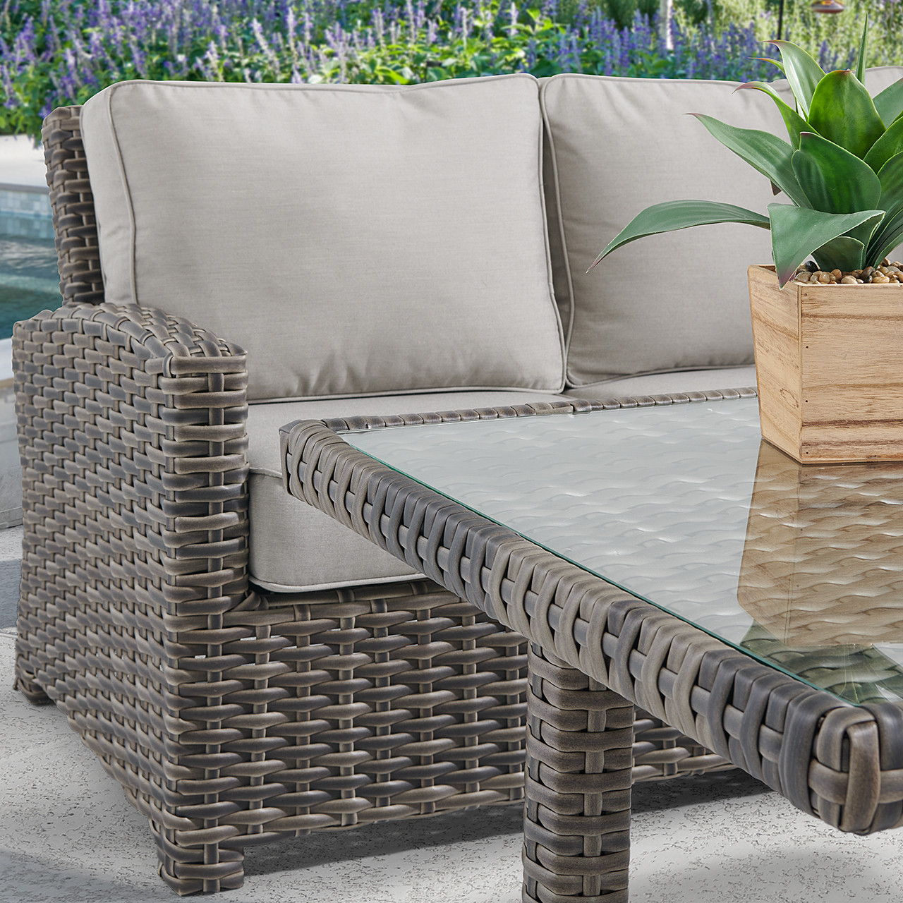 Contempo Husk Outdoor Wicker with Cushions 4 Piece Swivel Sofa Group + 65 x 34 in. Lounge Table